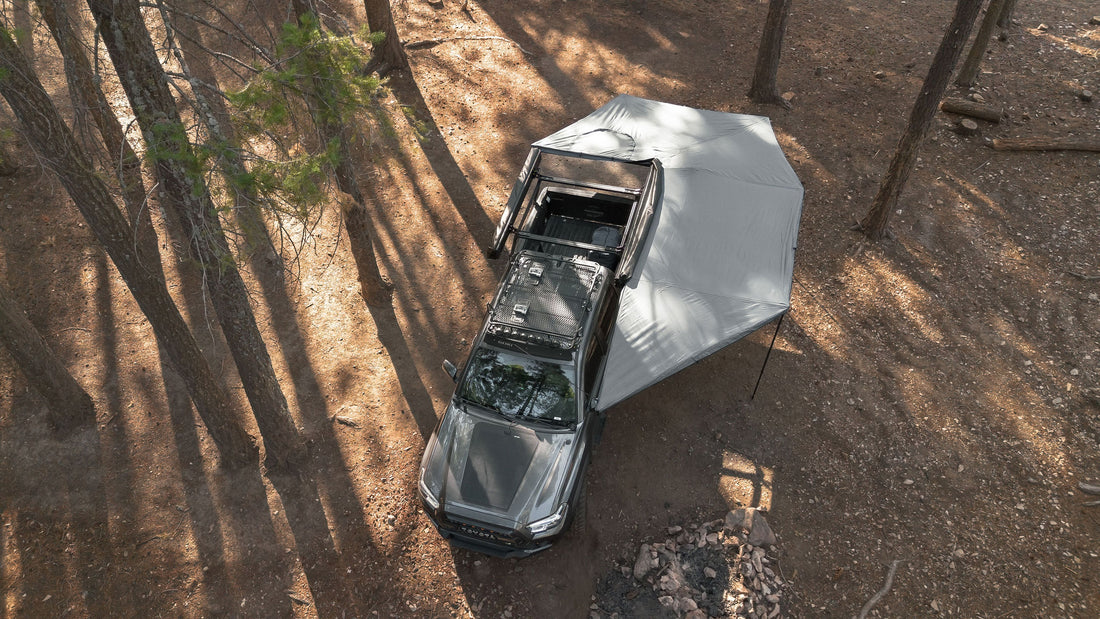 Taruca Rogue 270+ XC D-Access awning overhead view showing the full shade footprint around the truck