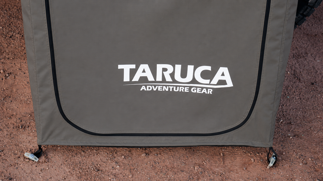 Taruca Ensuite Shower 2.0 close-up of TARUCA ADVENTURE GEAR logo on shower panel