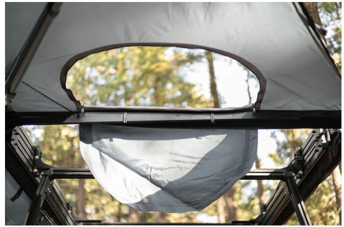 Rear window opening in the Taruca 270+ XC D-Access awning canvas for rooftop tent access, seen from inside