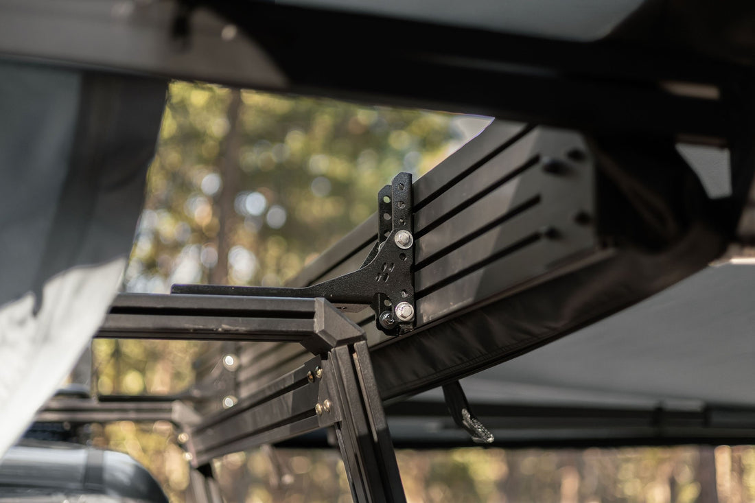 Taruca Rogue 270+ XC awning close-up of black hinge and mounting bracket hardware