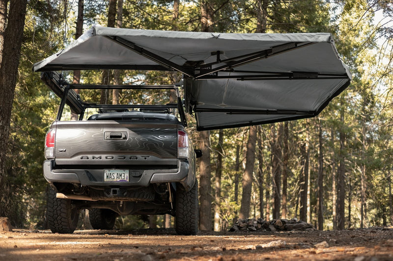 Rear view of a Toyota Tacoma with the Taruca Rogue 270+ XC awning fully deployed