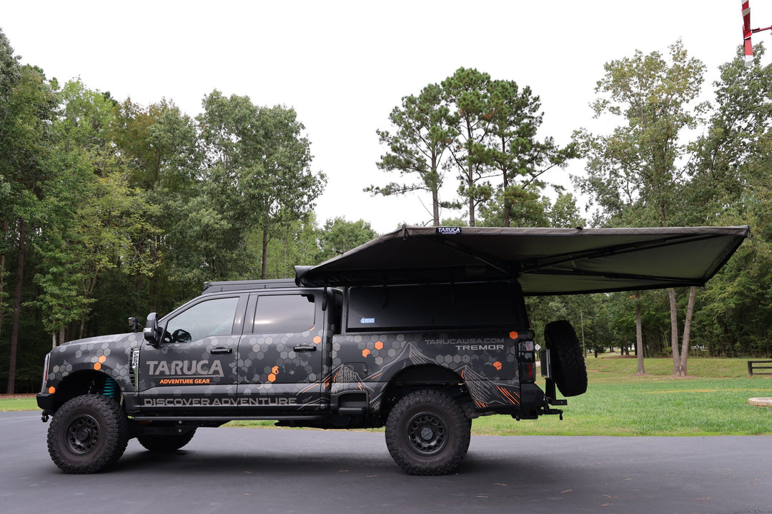 Taruca Rogue 270 S awning side panel extended during setup, driver side profile