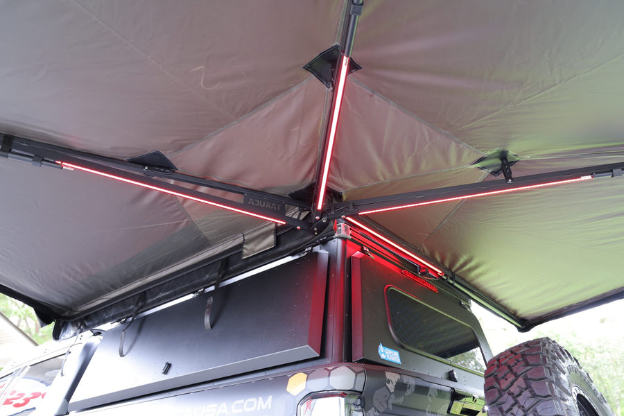 Taruca Rogue 270 S awning underside with integrated LED light bars in red and white