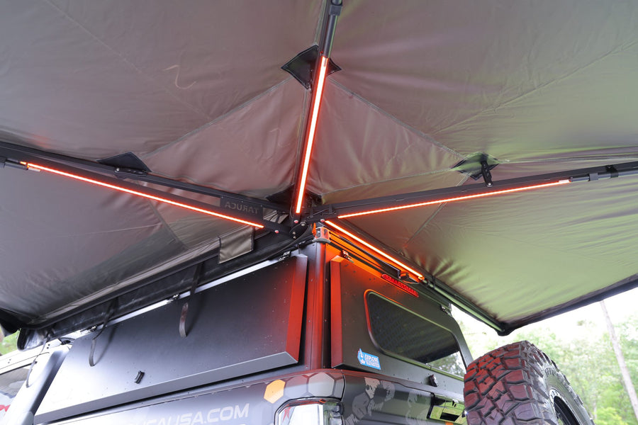 Taruca Rogue 270 S awning underside with integrated LED light bars in amber and red
