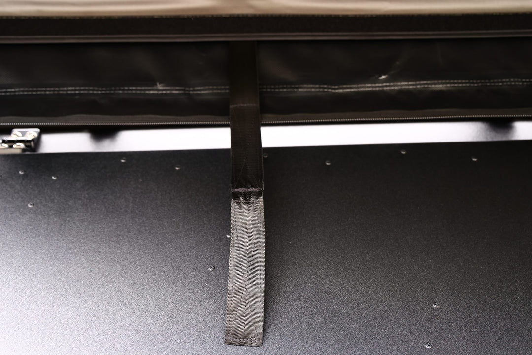 Taruca Rogue 270 S awning strap hanging from the packed cover
