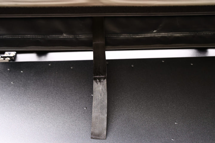 Taruca Rogue 270 S awning strap hanging from the packed cover