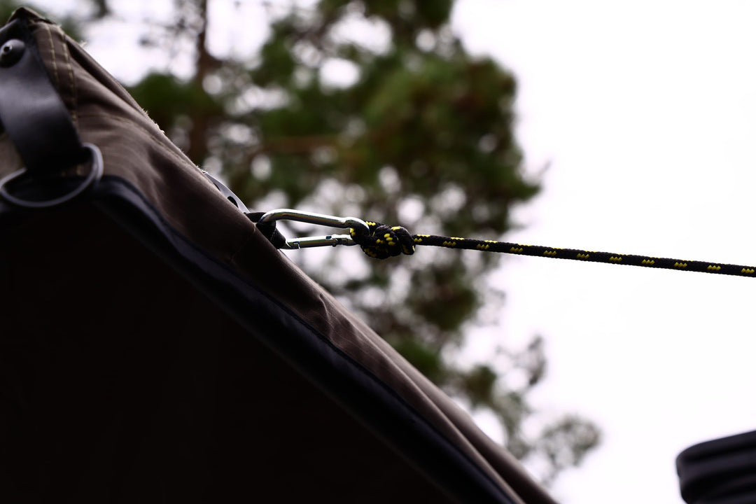 Taruca Rogue 270 S awning guy line with quick-release clip at the canopy edge