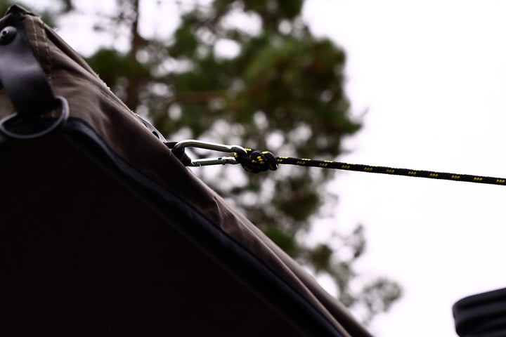 Taruca Rogue 270 S awning guy line with quick-release clip at the canopy edge